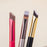 Set of angled eyebrow brush for concealer with soft bristles and colorful handles for precise makeup application