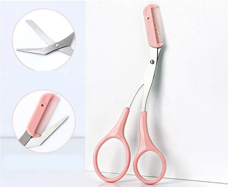 Cosmo eyebrow trimming knife with pink handles and built-in comb for precise eyebrow grooming