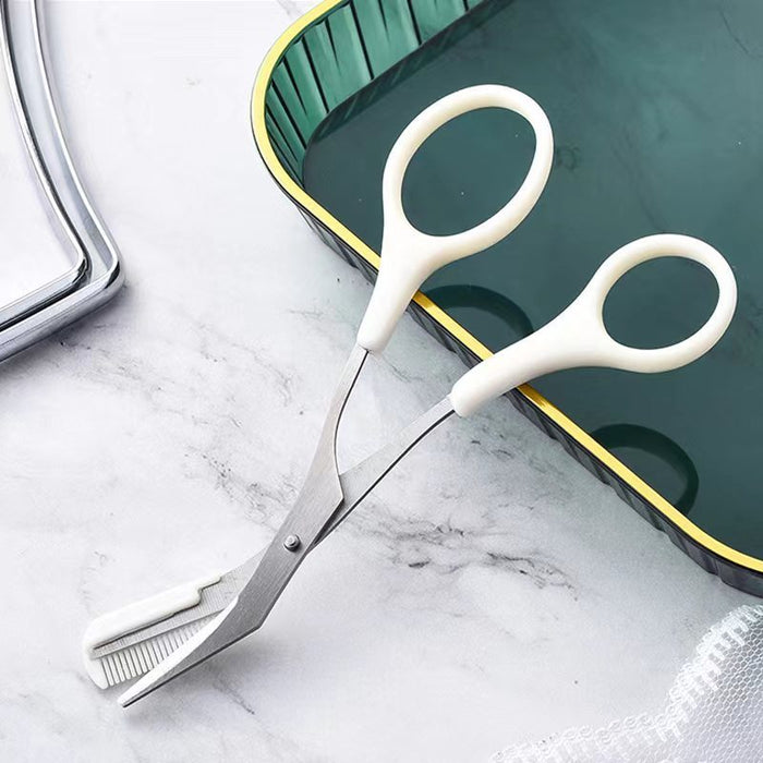 White handled eyebrow trimming knife with comb blade on marble surface near green tray