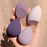 Set of four Cosmo makeup blending sponge in different shades held in hand for flawless makeup application