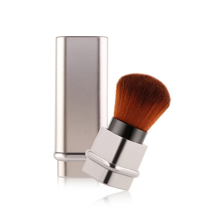 Compact travel makeup brush for foundation with soft bristles and silver protective case